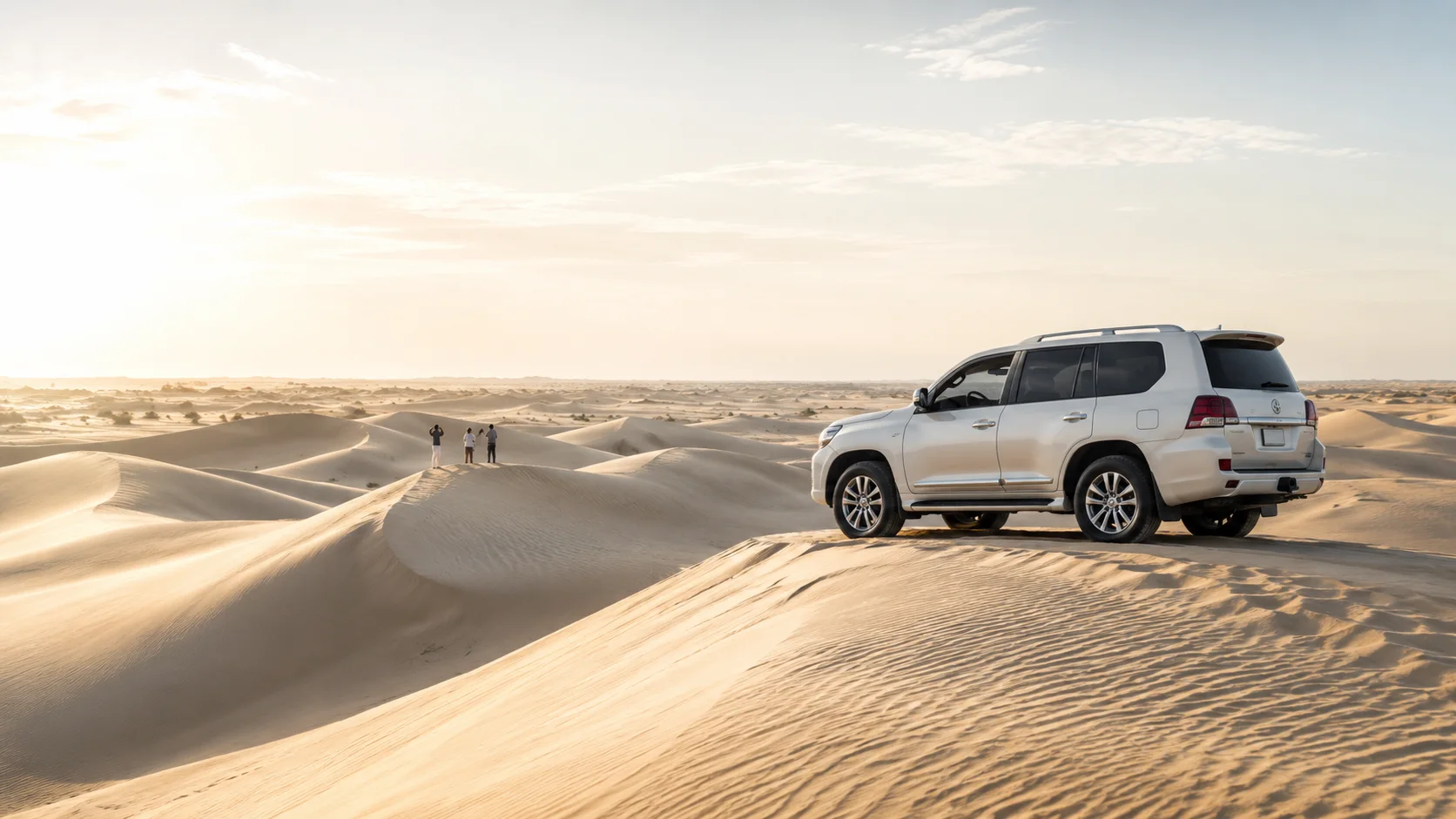 Morning Dubai desert safari 4x4 on bright dunes